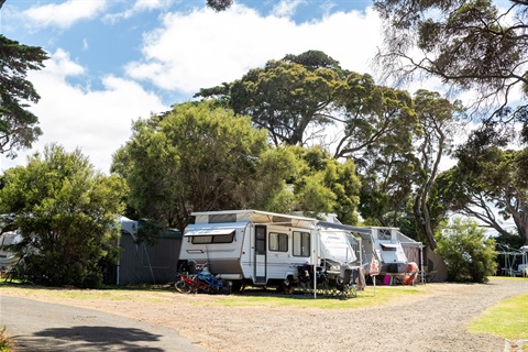 A caravan set up at Queenscliffe Tourist Parks