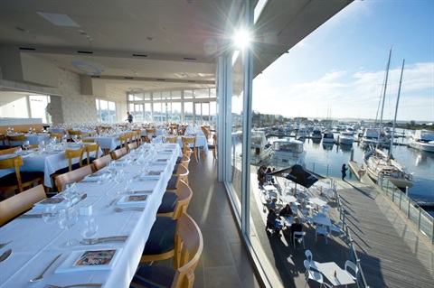 Wedding dining tables set up at 360Q overlooking the harbour