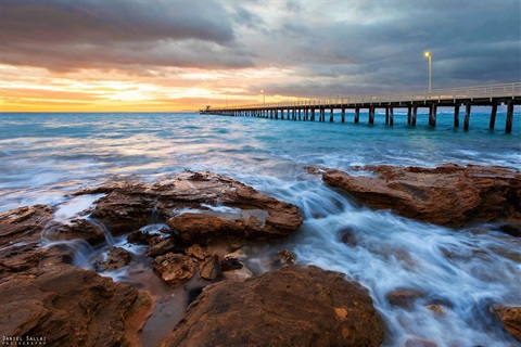 Rocks by a pier