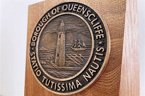 BoQ seal engraved on wooden block