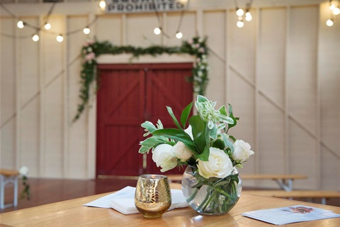 A bouquet of flowers positioned at a wedding ceremony in the Princess Park Pavilion