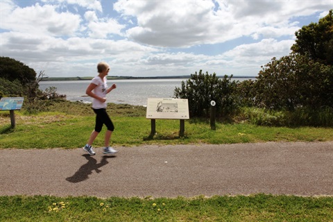 A jogger runs along the Bellarine Rail Trail