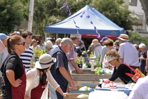 Visitors at a Cottage by the Sea market event