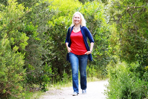 Woman walking along the Queenscliff Ferry to Pier trail