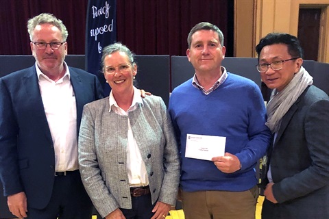 Mayor Ross Ebbels and Cr Donnie Grigau with representatives from the Queenscliff Football Netball Club at the 2022-23 Community Grants presentation night